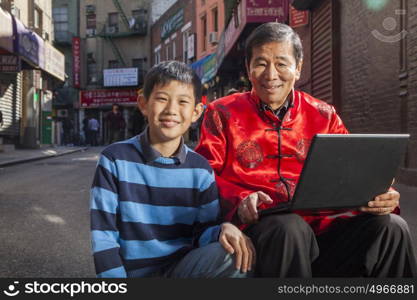 Asian family in front of store