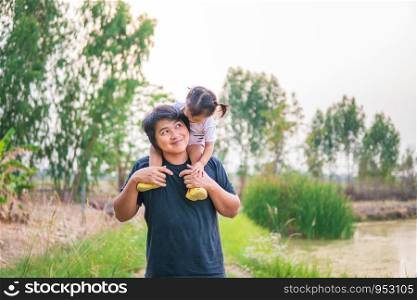 Asian father and son Playing happily