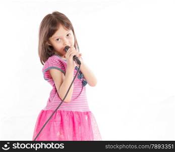 Asian female child singing with a microphone