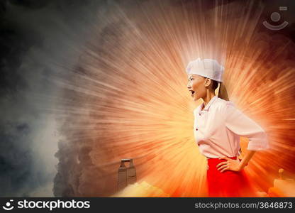 Asian female cook in anger against color background with shine effects