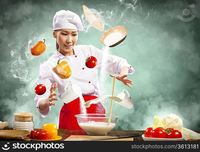 Asian female cooking with magic against color background