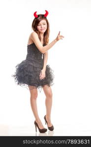 Asian female in devil halloween costume pointing finger