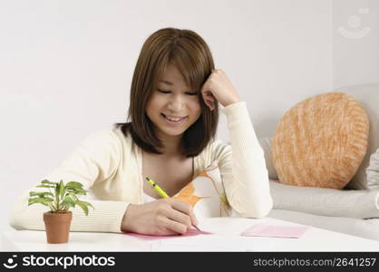 Asian female on a mobile phone