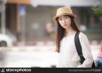 Asian female tourists looking for travel routes