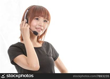 Asian female wearing a headset microphone
