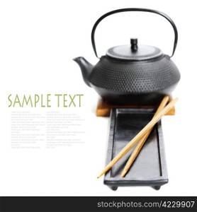 Asian food concept (Tea pot and chopsticks) with sample text