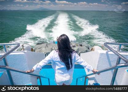 Asian girl in a speed boat at Krabi, Thailand