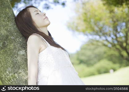 Asian girl in park