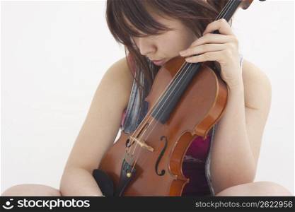 Asian girl playing violin