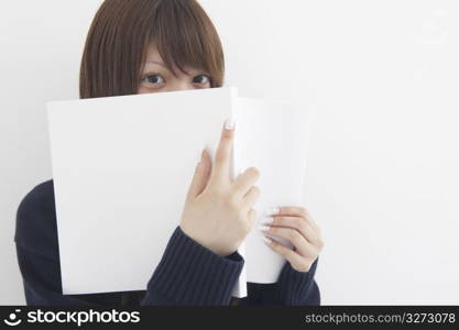 Asian girl reading book