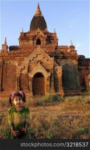 Asian Girl Standing In Front of Historic Building