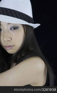 Asian girl wearing white hat