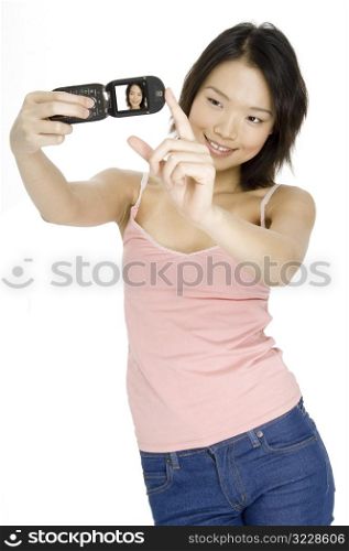 Asian Girl With Cameraphone