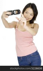 Asian Girl With Cameraphone