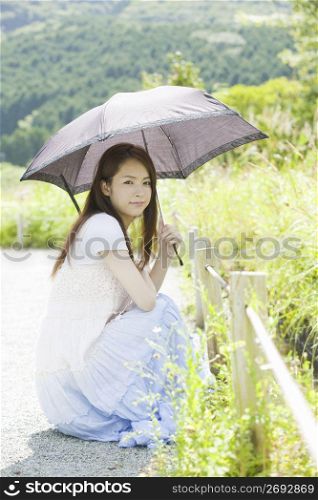 Asian girl with umberella