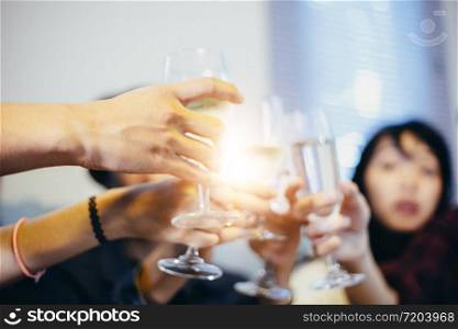 Asian group of friends having party with alcoholic beer drinks and Young people enjoying at a bar toasting cocktails