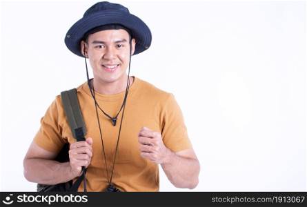 Asian handsome man wearing hat and backpack for traveling while standing on white background