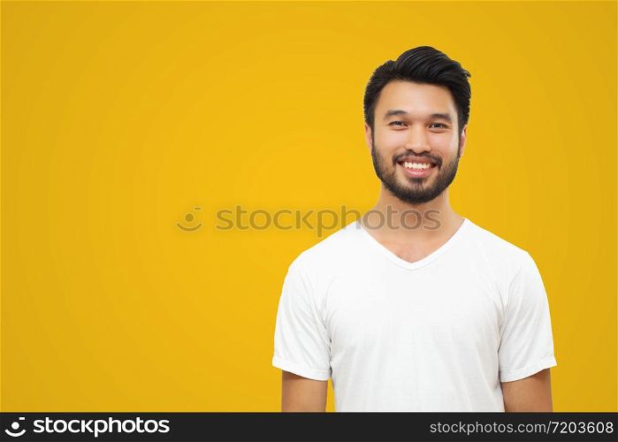 Asian handsome man with a mustache, smiling and laughing isolated on yellow background