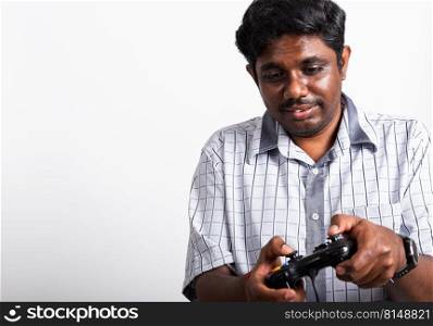 Asian happy portrait young black man funny use hand playing video game pad joystick controller, studio shot isolated on white background