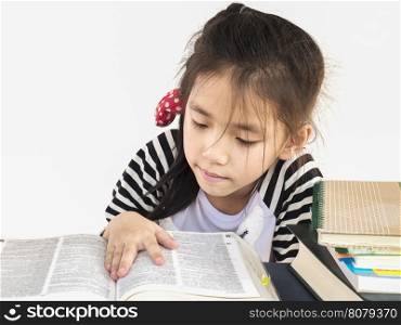 Asian kid is reading book