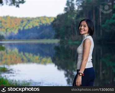 Asian lady standing at Pang Oung lake