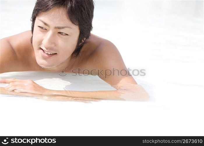 Asian man at the beach