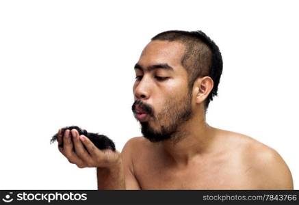 Asian man blowing his hair from haircuton white background.