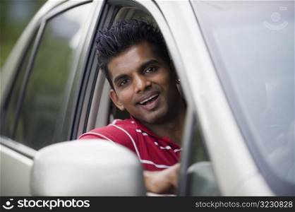 Asian Man In Car