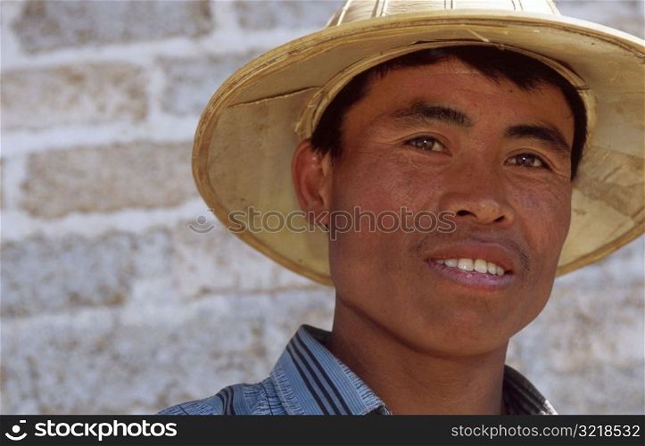 Asian Man Wearing Straw Hat