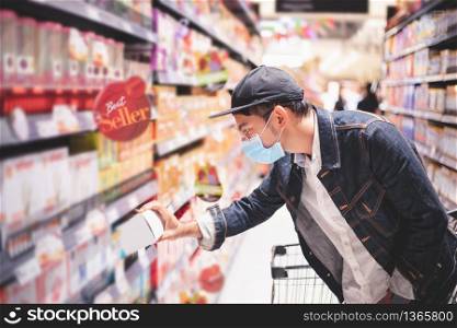 Asian men buy and shopping food for hoarding in during the Covid outbreak