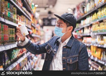 Asian men buy and shopping food for hoarding in during the Covid outbreak