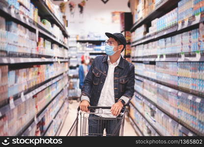 Asian men buy and shopping food for hoarding in during the Covid outbreak