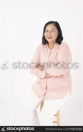 Asian older woman on white background