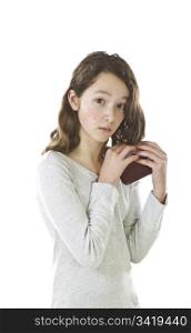 Asian Preteen girl hiding cell phone on white background