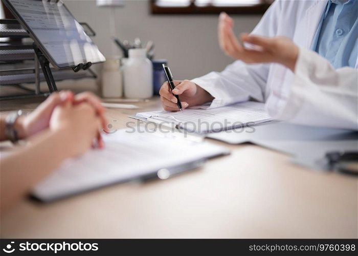 Asian psychologist women giving counseling to explaining about medicine with mental health therapy to patient in clinic while female patient stressful and anxiety with psychological health problem.