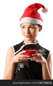 asian santa claus girl holding traditional red chinese cup for rice