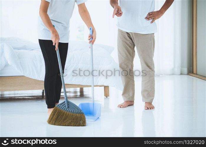 Asian senior couple cleaning bedroom floor. Retirement and healthy elderly concept.