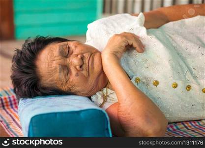 Asian senior woman sleeping in the house