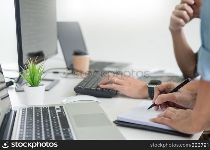 Asian team Outsource Developer Looking Screen Programming Code Working with Laptop Computer Software