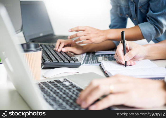 Asian team Outsource Developer Looking Screen Programming Code Working with Laptop Computer Software