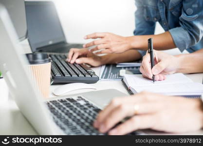 Asian team Outsource Developer Looking Screen Programming Code Working with Laptop Computer Software