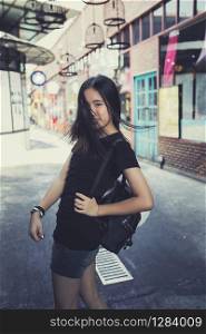 asian teenager with school backpack happiness emotion traveling location