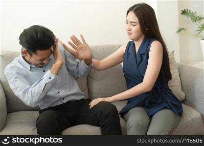 Asian wife does not understand the husband explanation about the mental health problems that have occurred with his wife and causes a fight. While sitting on the couch at home, Health and illness concepts