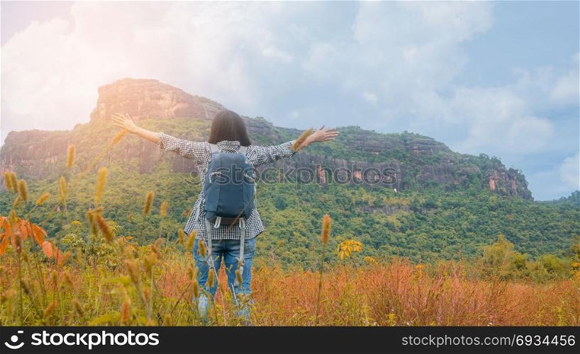 Asian woman backpacker . Asian woman backpacker enjoy the view at mountain