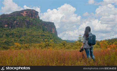 Asian woman backpacker . Asian woman backpacker enjoy the view at mountain