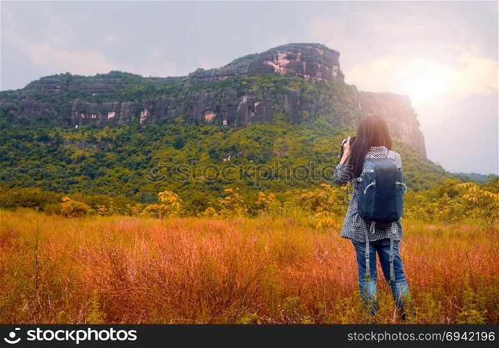 Asian woman backpacker . Asian woman backpacker take photo view of mountain