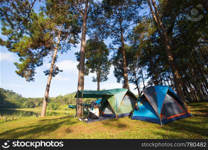 Asian woman camping in holiday. adventure camping travel and relax.