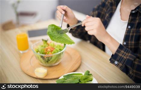 Asian woman dieting Weight loss eating fresh fresh homemade salad healthy eating concept.
