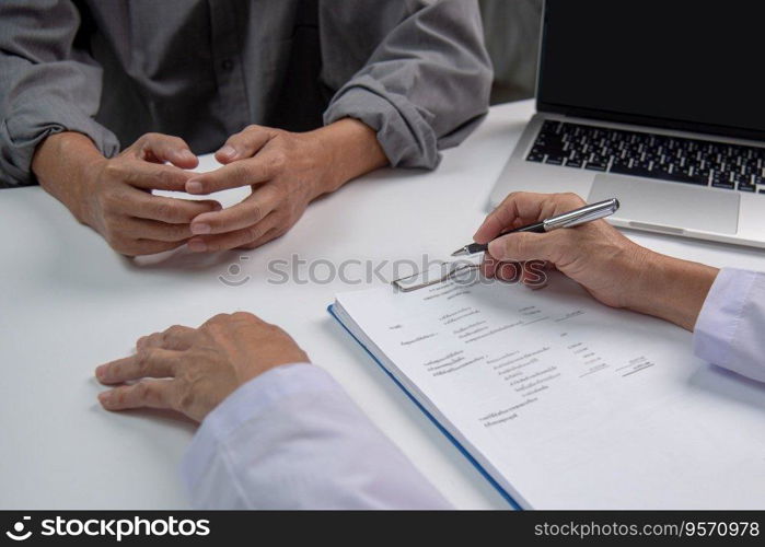 Asian woman doctor and senior elderly patient man patient. Healthcare and medicine concept.