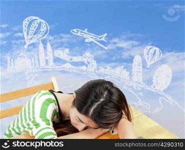 Asian woman dreaming about travel and holiday